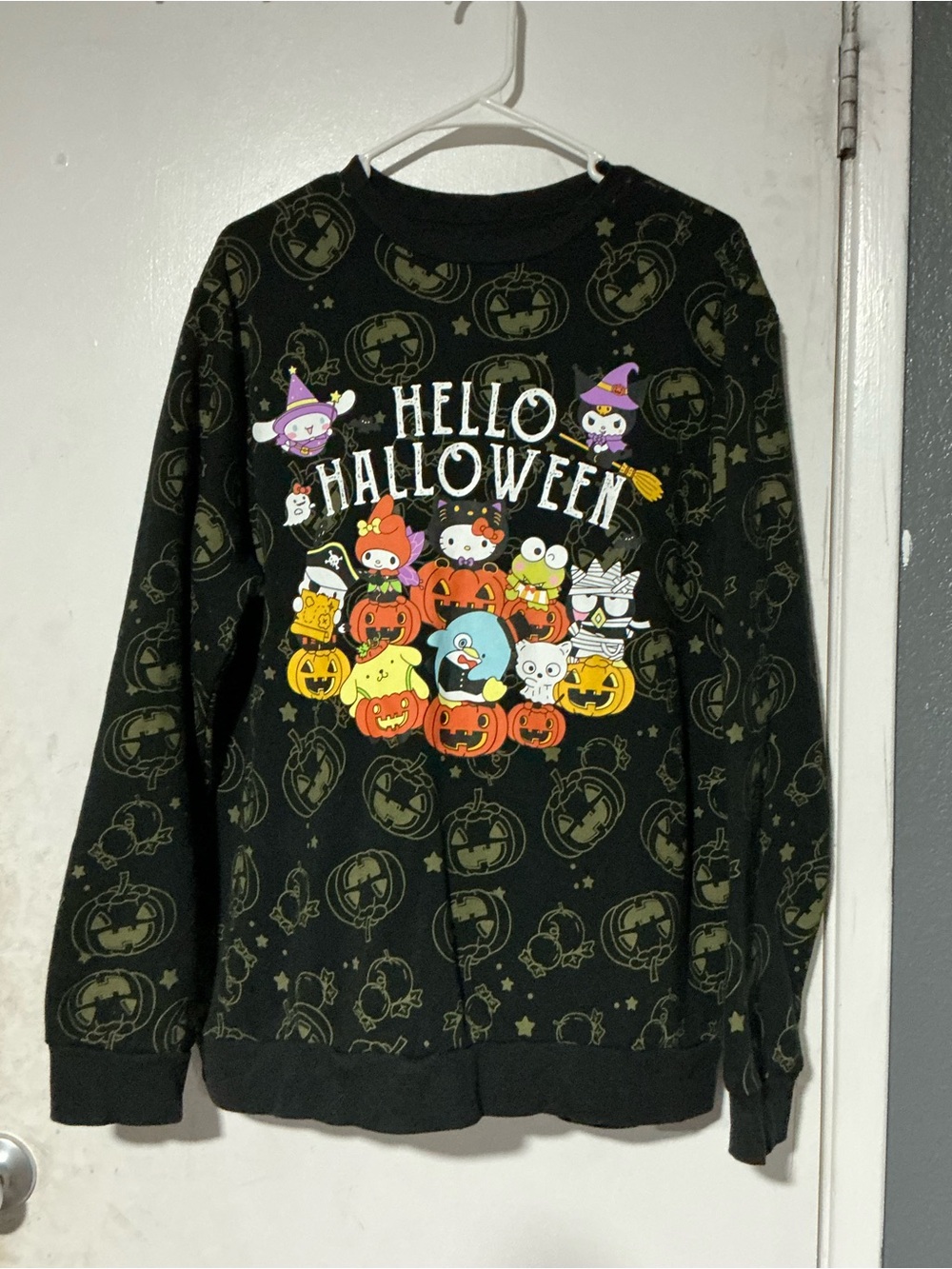 Sanrio Hello Halloween Graphic Crewneck Sweater - Black, Orange, Yellow, Purple